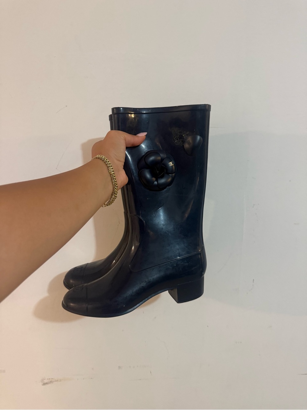 Chanel navy rain boots with Camillah flower accents